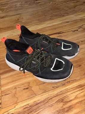 Steph Curry Black Athletic Sneakers with Neon Orange Accents